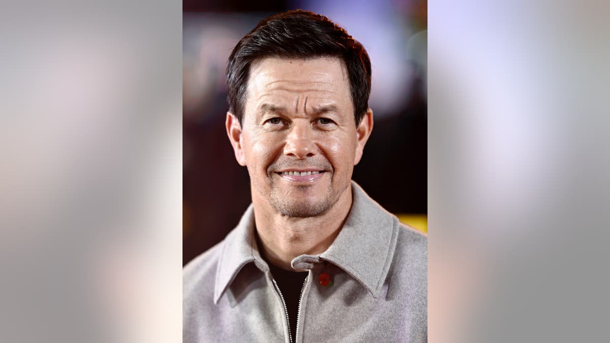 Mark Wahlberg standing at the Family Plan 2 world premiere in London