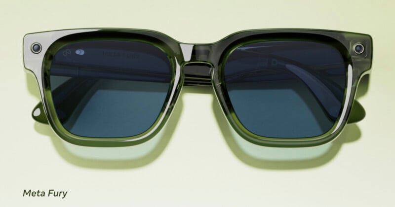 Green sunglasses with dark lenses shown against a light green background. The words "Meta Fury" are printed in the bottom left corner.