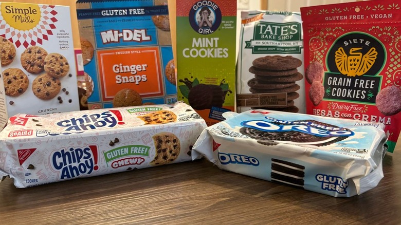 gluten-free cookie boxes on top of table, including packages from Oreo, Chips Ahoy, and Goodie Girl