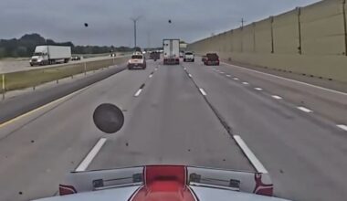 NASCAR hauler hits flying wheel in wild traffic incident caught on camera