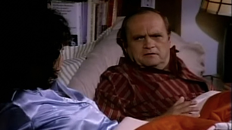 Robert Hartley sitting up in bed