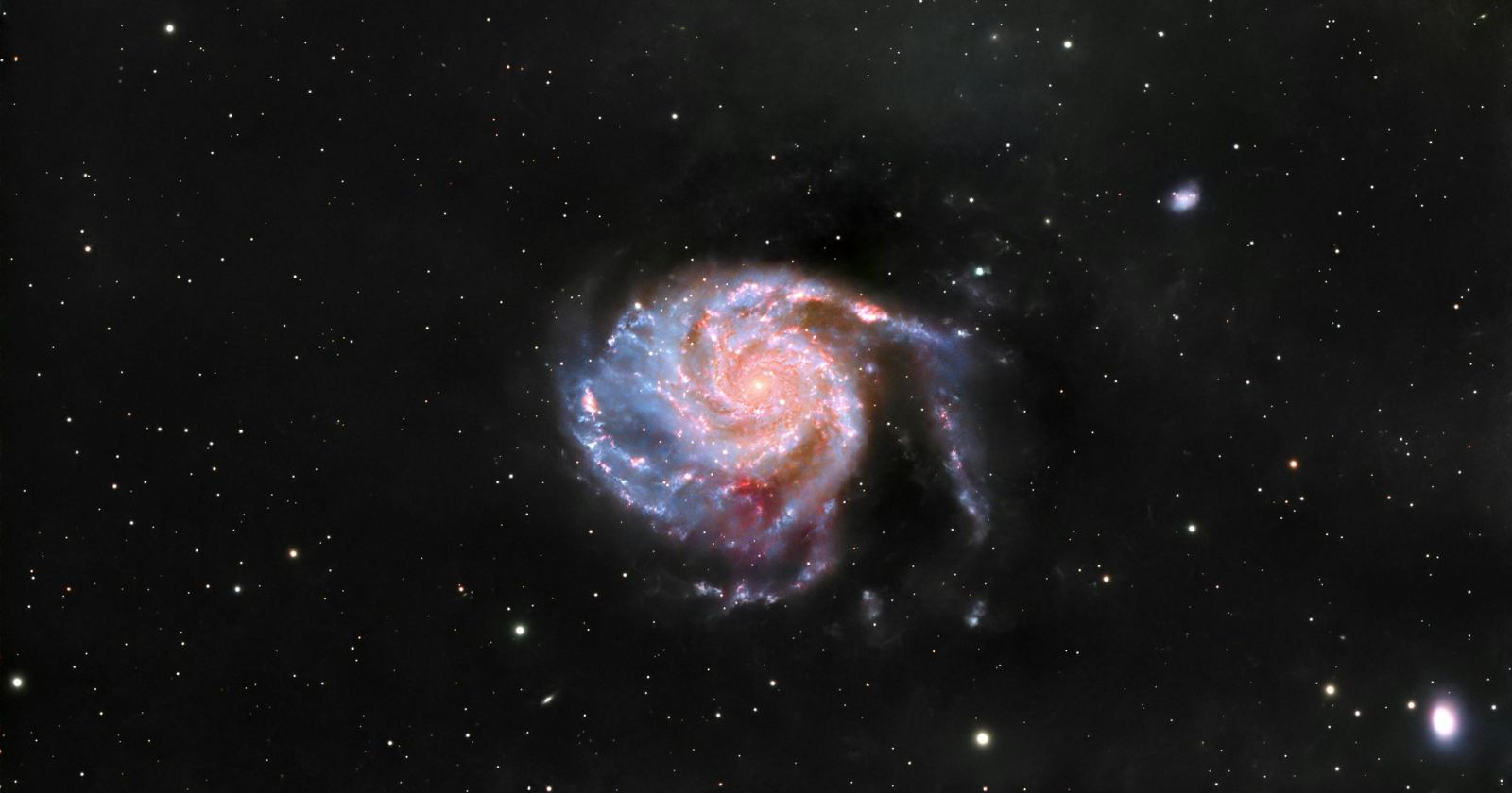 In 1995, astronomers aimed the Hubble Space Telescope at a tiny patch of sky that looked almost empty — a dark spot near the Big Dipper no wider than a pinhead held at arm’s length. After 10 days of exposures, the darkness resolved into roughly 3,000 galaxies, hiding in a place where the human eye saw nothing at all.
