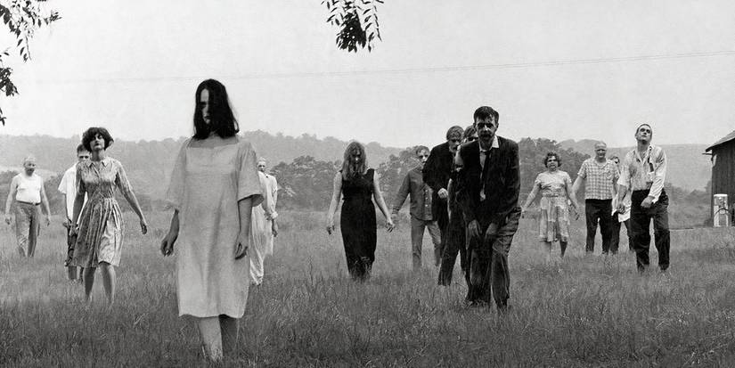A horde of zombies walks towards the camera in Night of the Living Dead (1968).