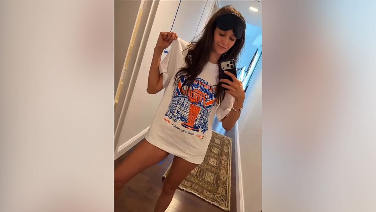 Nina Dobrev in a white Knicks shirt on Instagram.