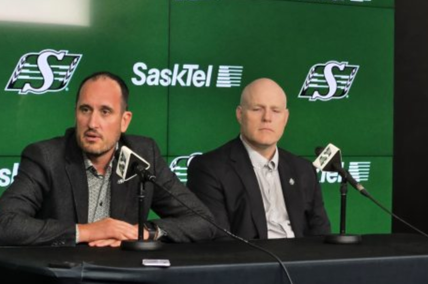 Saskatchewan Roughriders CEO Craig Reynolds (left) and Chief Financial Officer Kent Paul announce the team's financials from last season.