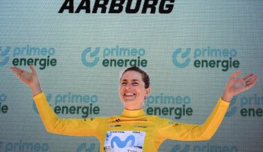 Switzerland's Marlen Reusser wearing the overall leader's yellow jersey celebrates on the podium after winning in the fourth stage, a 23,7 km time trial from Aarburg to Aarburg, at the Women&rsquo;s Tour of Switzerland (Tour de Suisse) cycling race in Aarburg, Switzerland, on June 20, 2026. (Photo by Fabrice COFFRINI / AFP)