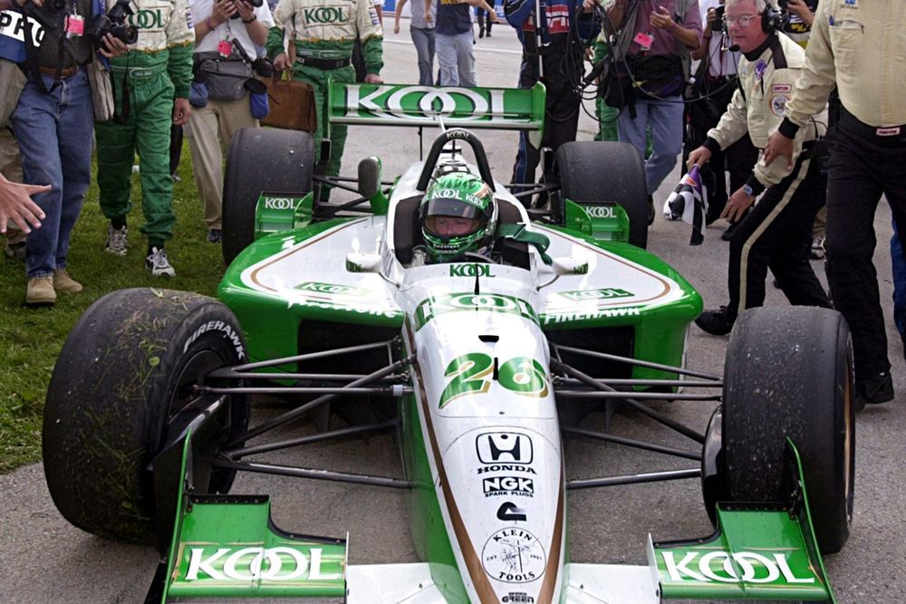 Tracy pulls into the winners' circle after a last-to-first charge at Road America in 2000