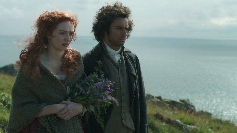 Demelza and Ross standing by the sea on Poldark S1E6