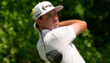 J.T. Poston handles wind to take lead at Memorial