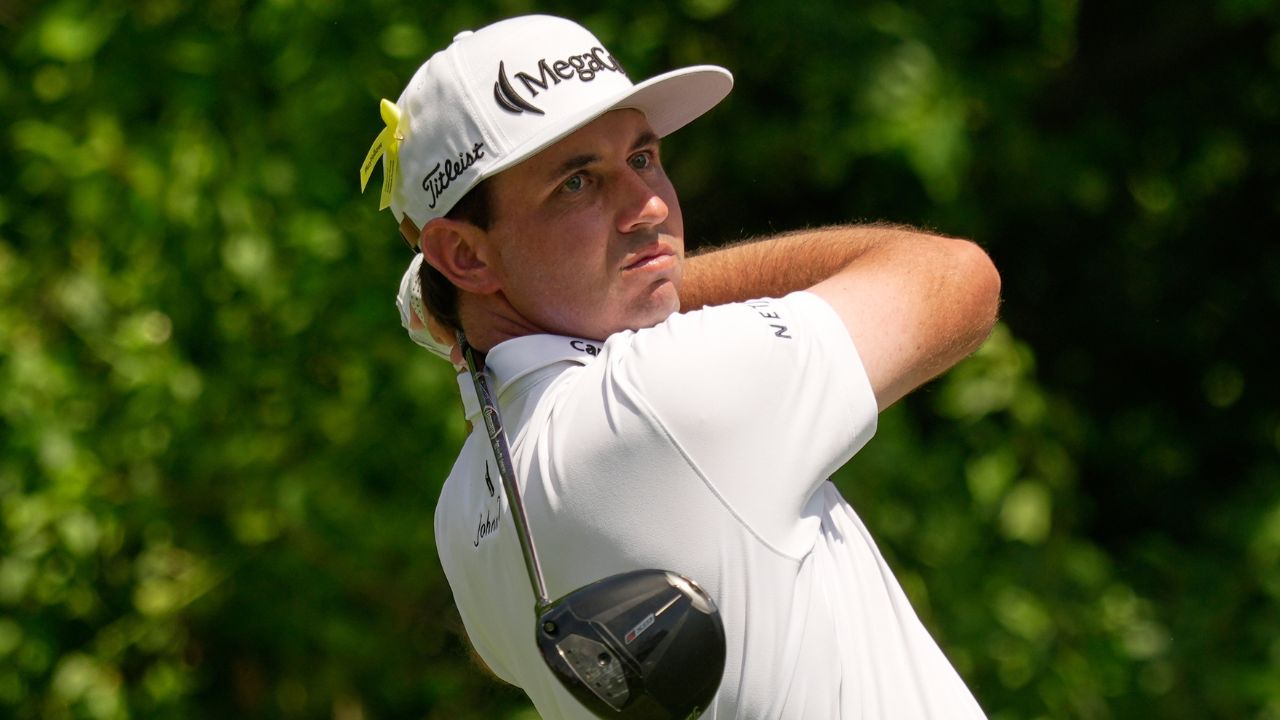 J.T. Poston handles wind to take lead at Memorial