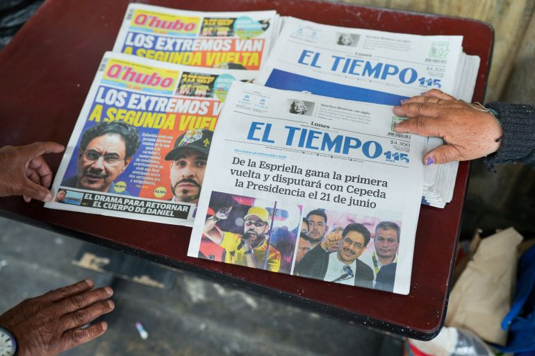 Newspapers at a newsstand show the results of the first round of Colombia's presidential election, in Bogota, Colombia, June 1, 2026. REUTERS/Enea Lebrun