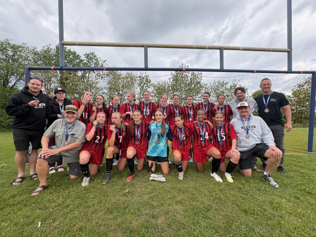 Saints girls' soccer team claims OFSAA antique bronze medal