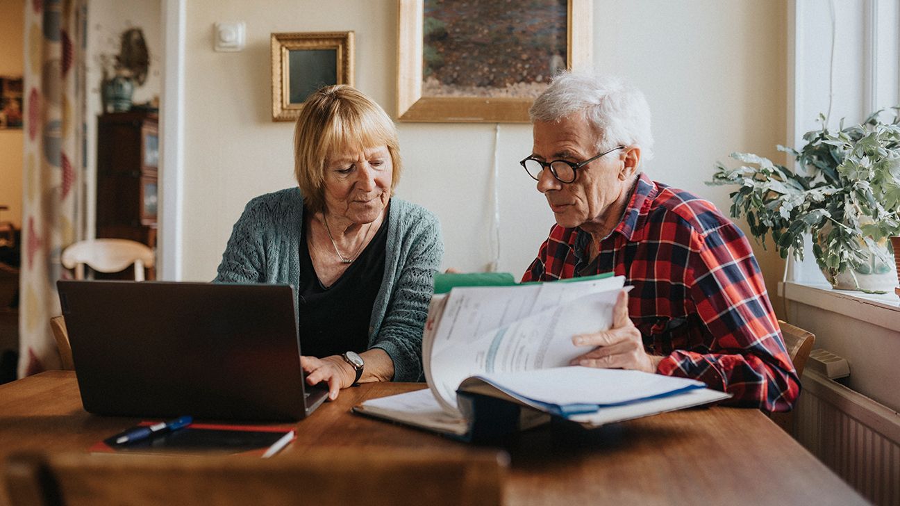 Older couple reviewing Medicare options on laptop
