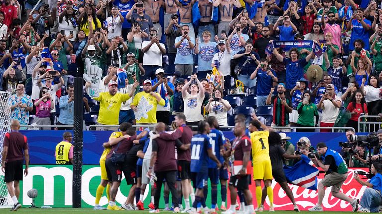 Cape Verde celebrates with their fans after their spot in the round of 32 was confirmed