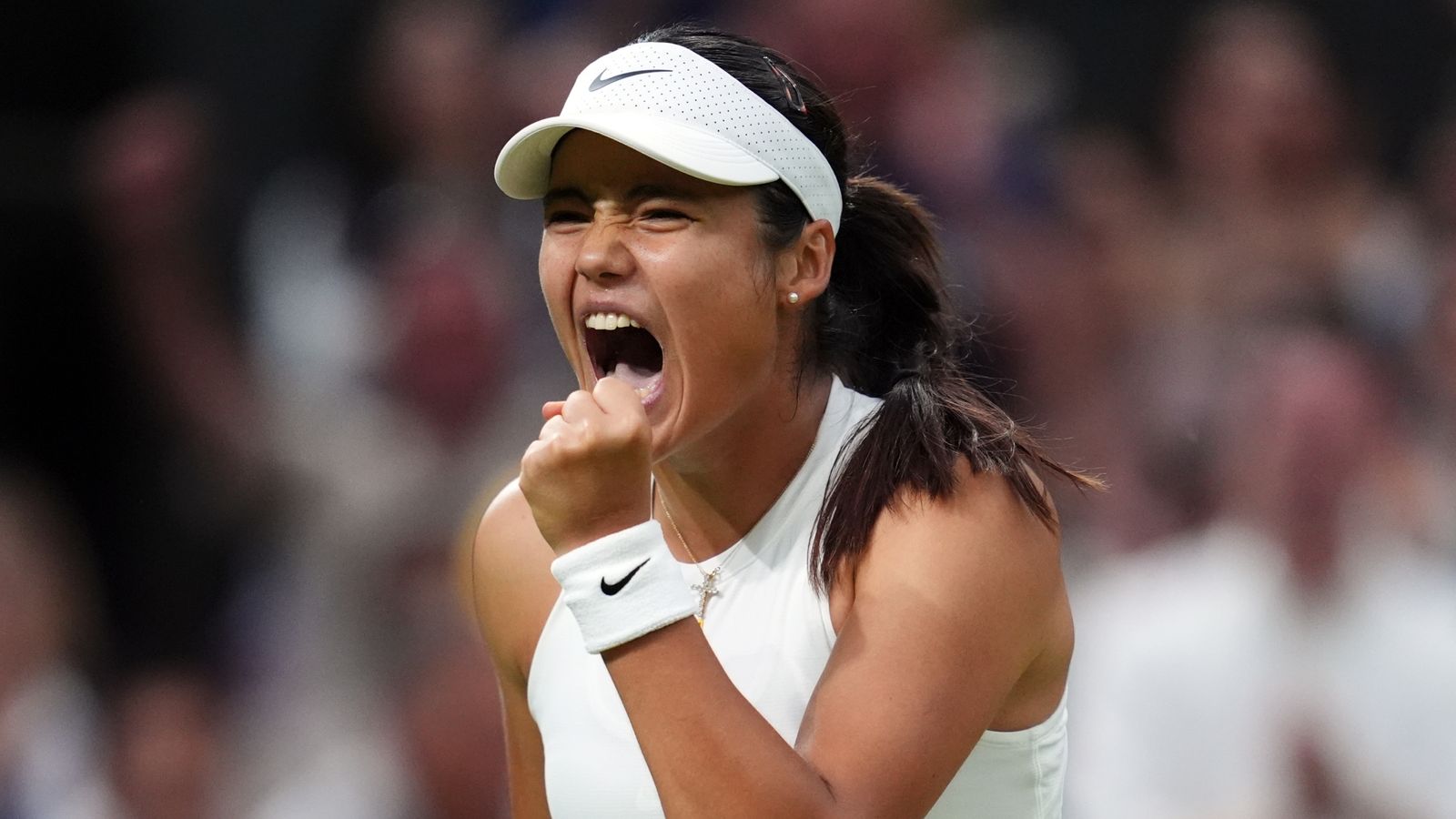 Emma Raducanu reacts during her match against Aryna Sabalenka on day five of the 2025 Wimbledon Championships at the All England Lawn Tennis