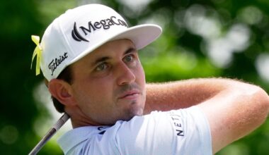 J. T. Poston watches his tee shot on the fifth hole during the final round of The Memorial