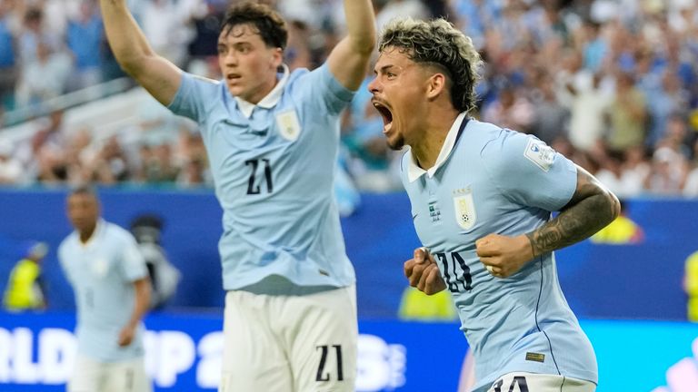Uruguay's Maxi Araujo celebrates scoring his side's opening goal against Saudi Arabia during a World Cup Group H match