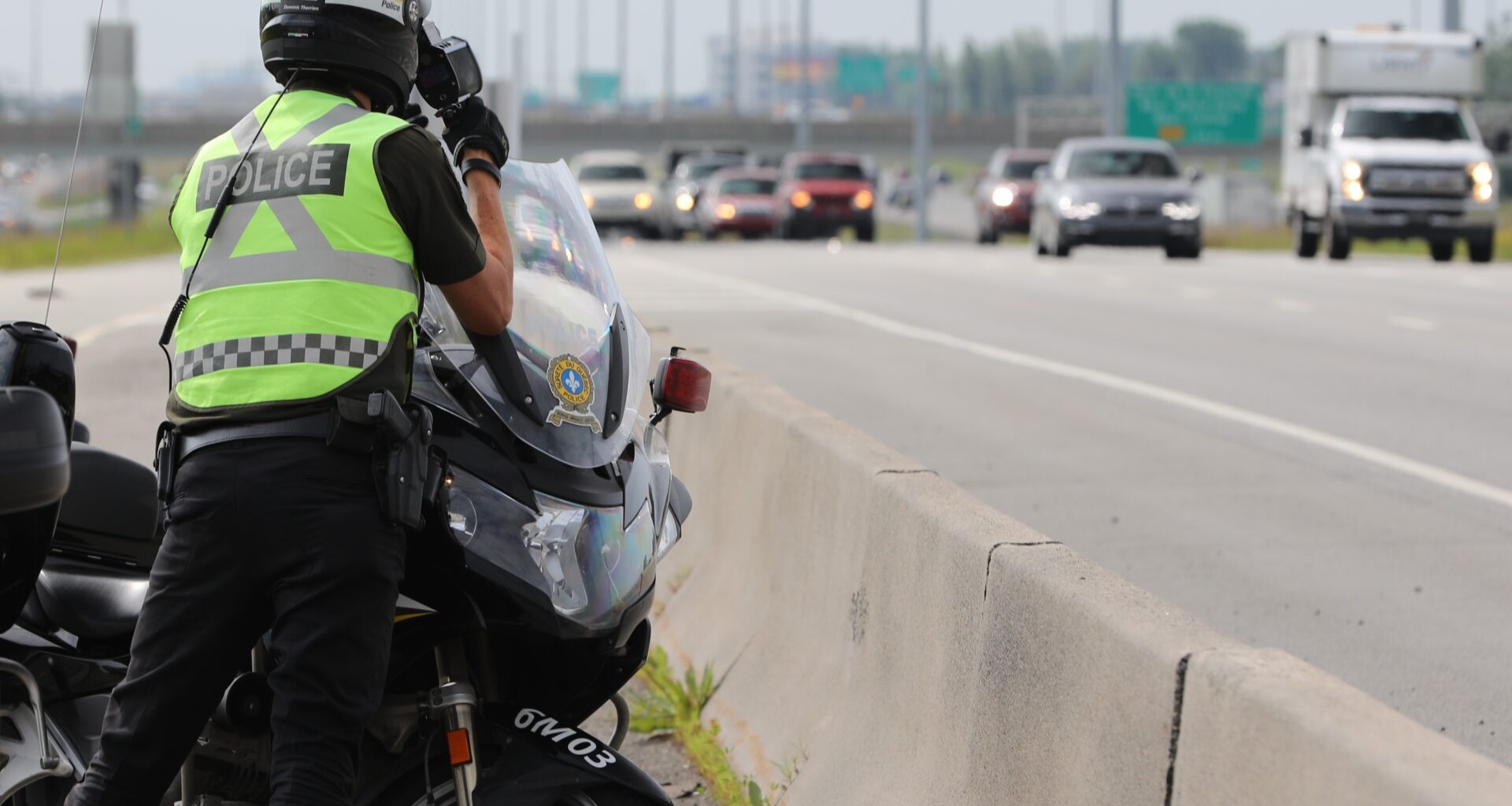 A Sûreté du Québec motorcycle officer takes part in a a road-safety program.