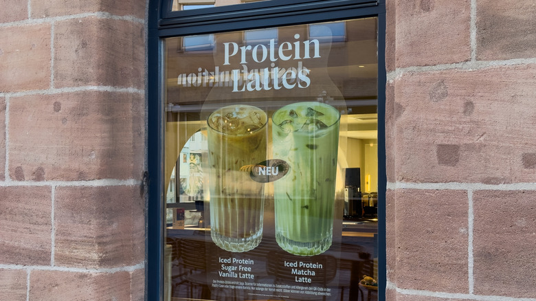 Starbucks window sign advertising protein lattes