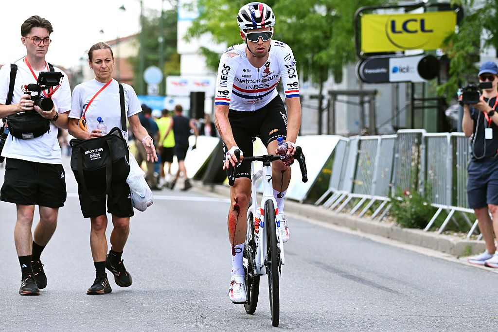 MONTROND-LES-BAINS, FRANCE - JUNE 10: (EDITOR&rsquo;S NOTE: Image contains graphic content.) Samuel Watson of Great Britain and Netcompany INEOS Cycling Team injured after the 78th Tour Auvergne-Rhone-Alpes 2026, Stage 4 a 167.4km stage from Le Puy-en-Velay to Montrond-les-Bains / #UCIWT / on June 10, 2026 in Montrond-les-Bains, France. (Photo by Dario Belingheri/Getty Images)