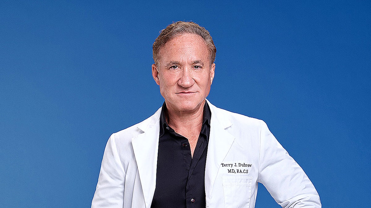 Dr. Terry Dubrow posing for a portrait for Botched Presents Plastic Surgery Rewind.