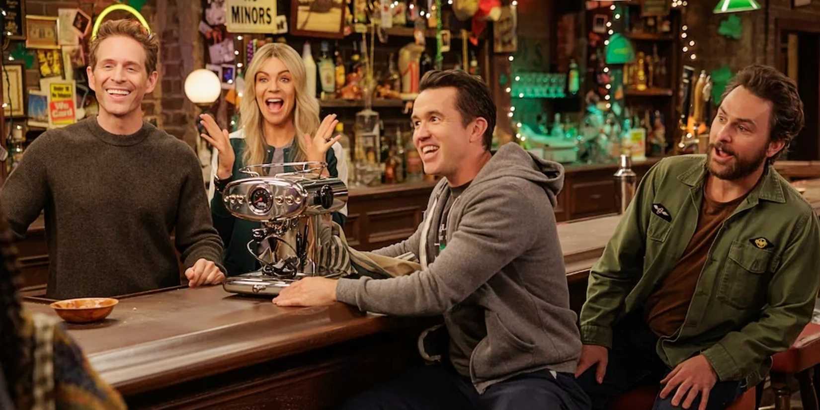 Dennis, Dee, Mac, and Charlie with a coffee maker at the bar in It's Always Sunny in Philadelphia Season 17.