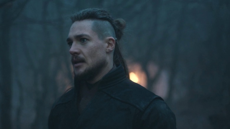 Uhtred standing in the forest on The Last Kingdom S5E1