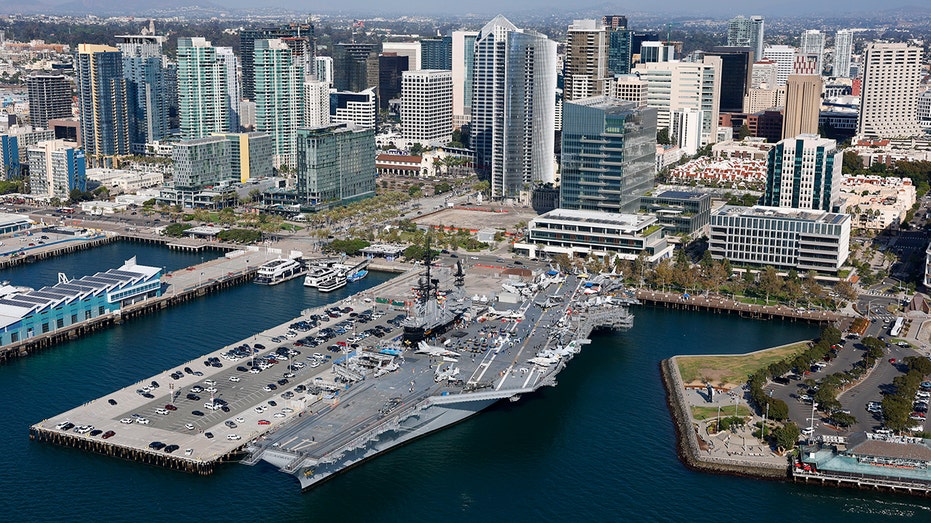 USS Midway Museum and downtown is seen along San Diego Bay