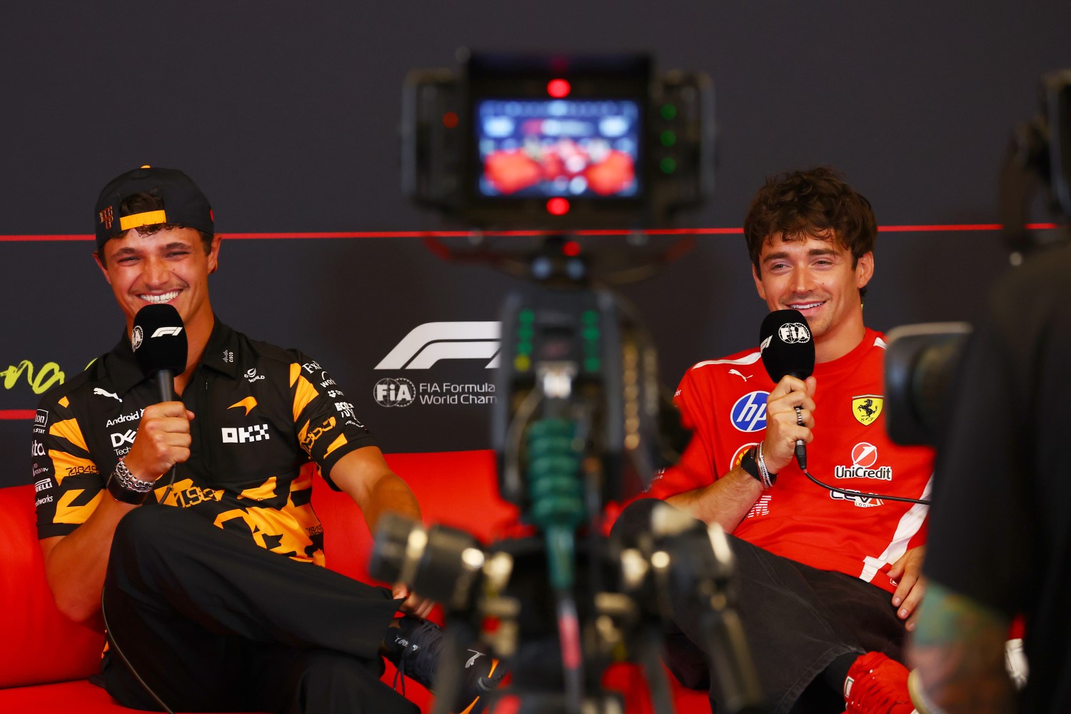 Lando Norris of Great Britain and McLaren and Charles Leclerc of Monaco and Scuderia Ferrari speak in the Drivers Press Conference during previews ahead of the F1 Grand Prix of Monaco at Circuit de Monaco on June 04, 2026 in Monte-Carlo, Monaco. (Photo by Joe Portlock/Getty Images for McLaren)