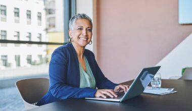 A person at a laptop.