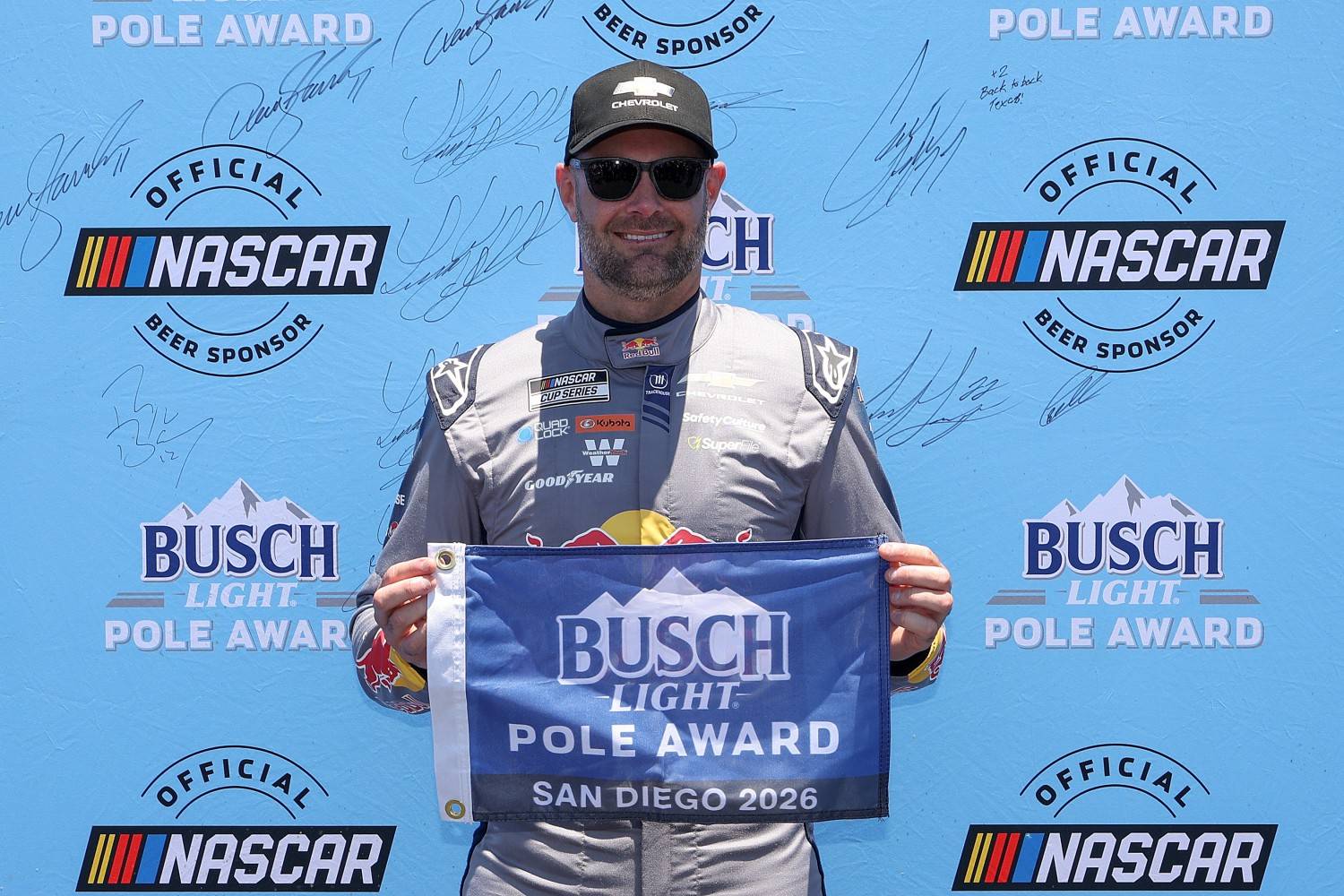 Shane Van Gisbergen, driver of the #97 Red Bull Chevrolet, poses for photos after winning the pole award during qualifying for the NASCAR Cup Series Anduril 250 at Naval Base Coronado on June 20, 2026 in San Diego, California. (Photo by James Gilbert/Getty Images)