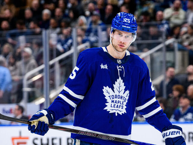 TORONTO, ON - MARCH 25: Toronto Maple Leafs Defenseman Brandon Carlo (25) reacts during the NHL regular season game between the New York Rangers and the Toronto Maple Leafs on March 25, 2026, at Scotiabank Arena in Toronto, ON, Canada.