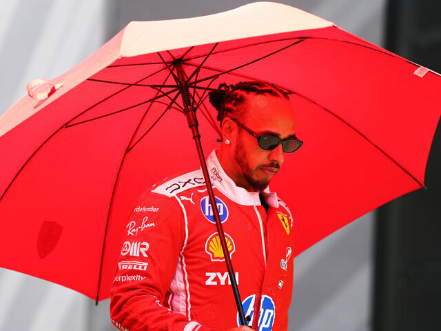 SPIELBERG, AUSTRIA - JUNE 25: Lewis Hamilton of Great Britain and Scuderia Ferrari walks in the Paddock during previews ahead of the F1 Grand Prix of Austria at Red Bull Ring on June 25, 2026 in Spielberg, Austria.