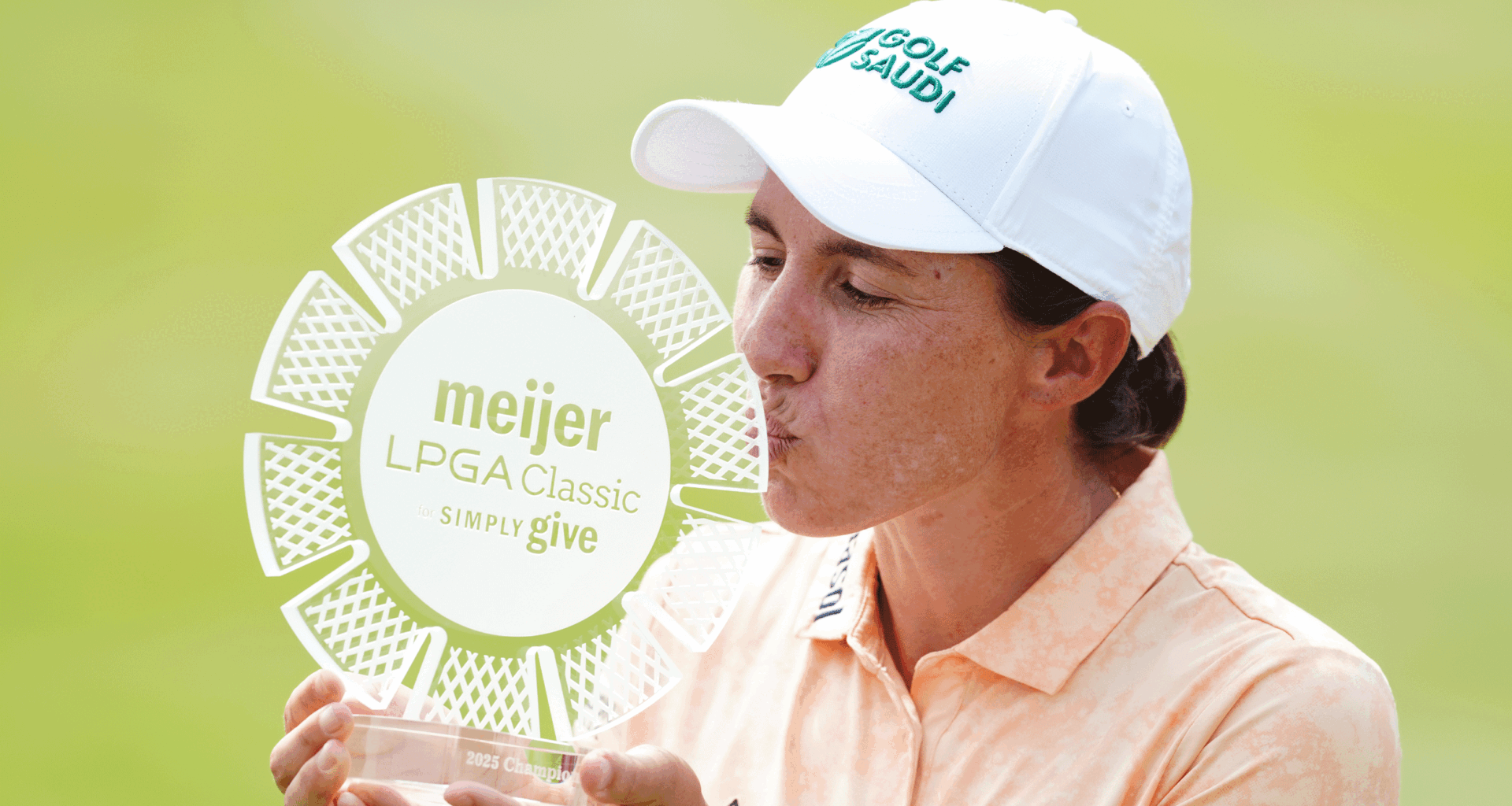 Carlota Ciganda kisses the Meijer LPGA Classic trophy following her win in 2025