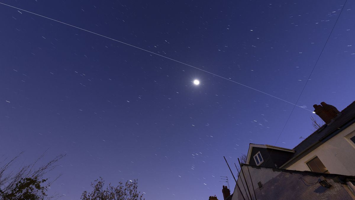 a long white streak across a star studded sky.