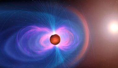 An illustration of a magnetic field around a red exoplanet in space