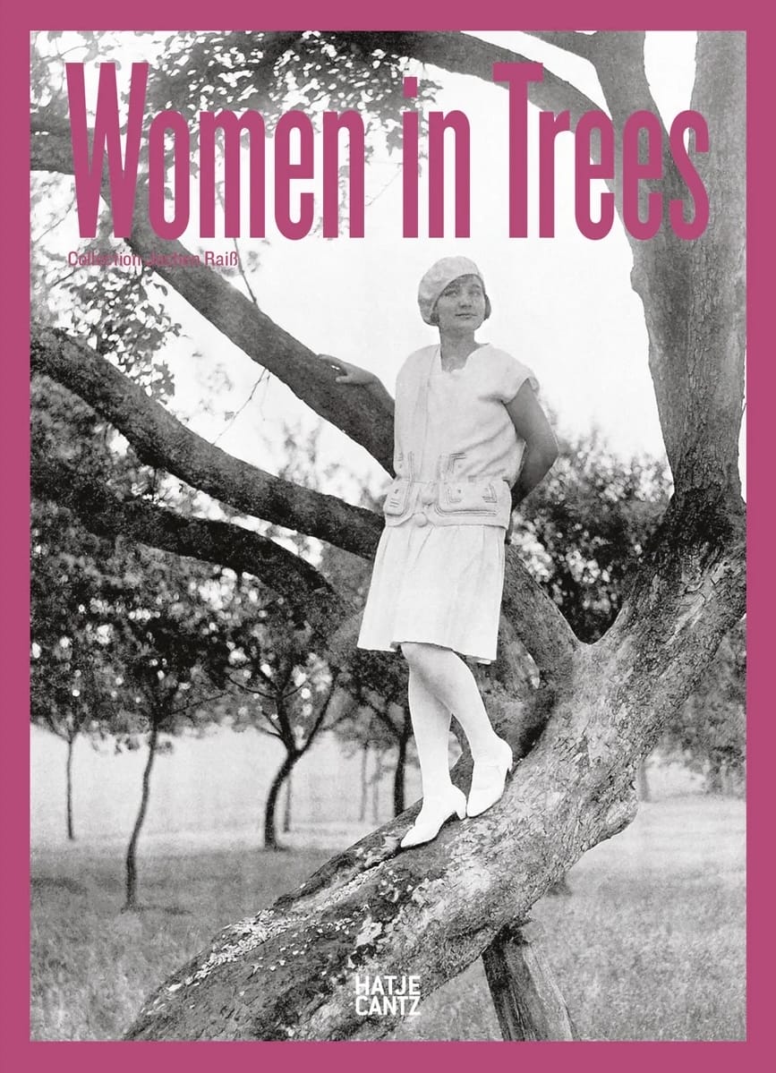 the cover of the book 'Women in Trees' with a black-and-white snapshot of a woman posing in a tree