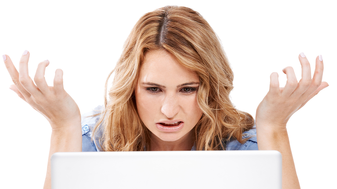 Recover files: a women looks frustrated at a computer screen
