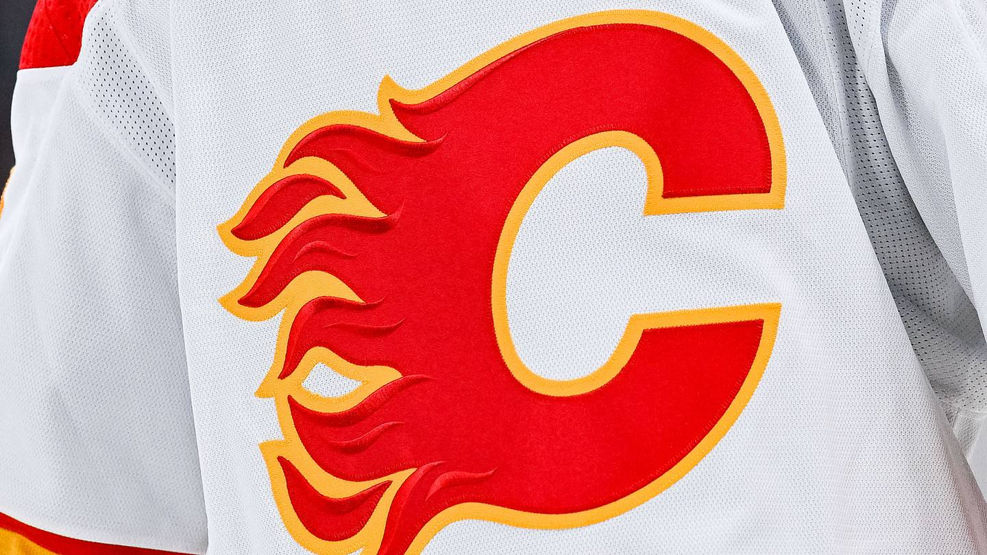 Dec 12, 2022; Montreal, Quebec, CAN; View of a Calgary Flames logo on a jersey worn by the member of the team during the second period at Bell Centre. Mandatory Credit: David Kirouac-USA TODAY Sports