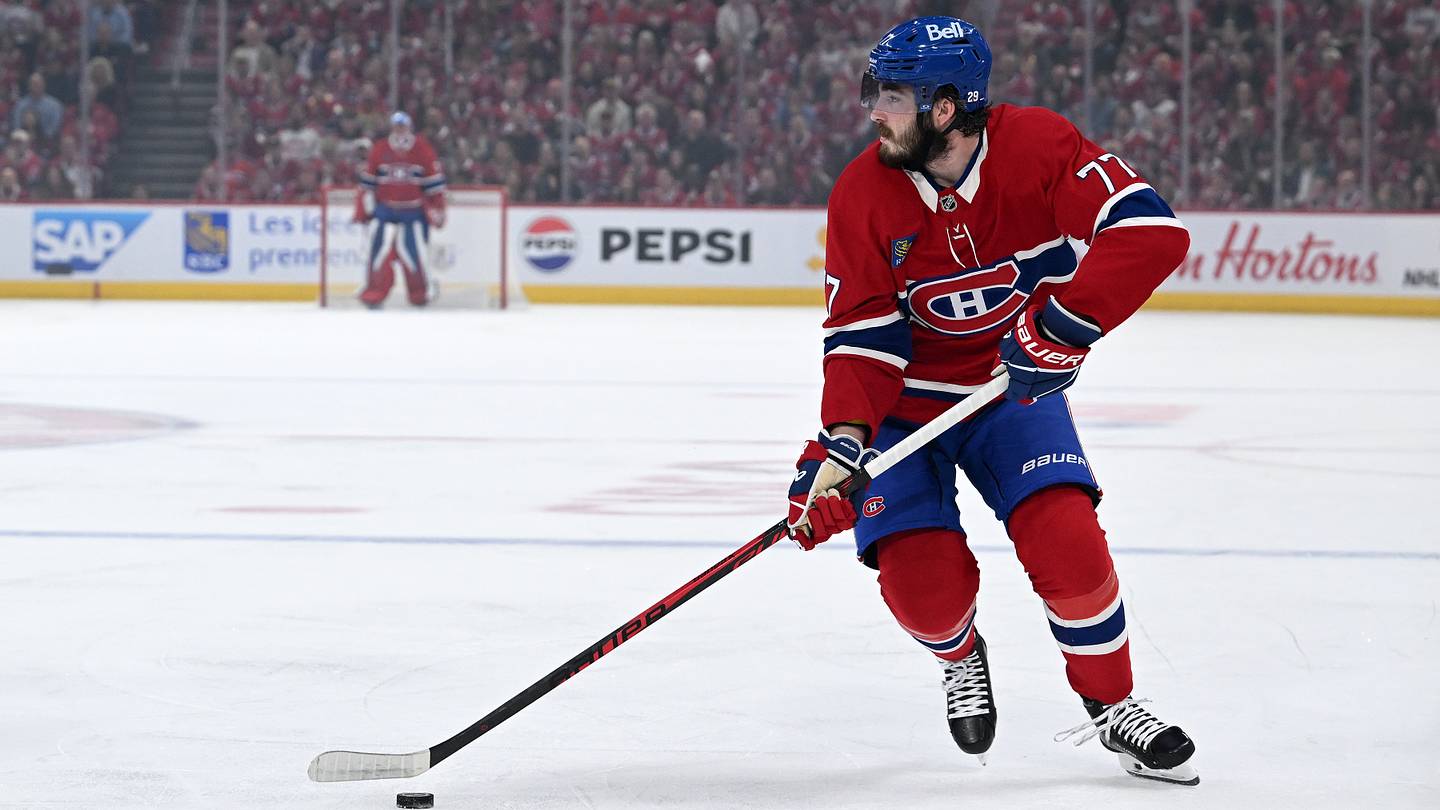 May 27, 2026; Montreal, Quebec, CAN; Montreal Canadiens center Kirby Dach (77) skates with the puck against the Carolina Hurricanes during the first period in game four of the Eastern Conference Final of the 2026 Stanley Cup Playoffs at Bell Centre. Mandatory Credit: David Kirouac-Imagn Images