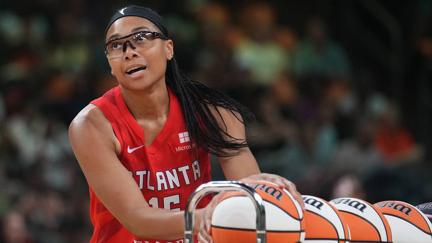 Atlanta Dream guard Allisha Gray gathers a ball during the WNBA All-Star Game 3-point contest at Footprint Center on Friday, July 19, 2024.