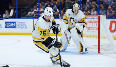 Apr 2, 2026; Tampa, Florida, USA; Pittsburgh Penguins defenseman Connor Clifton (75) controls the puck against the Tampa Bay Lightning in the third period at Benchmark International Arena. Mandatory Credit: Nathan Ray Seebeck-Imagn Images