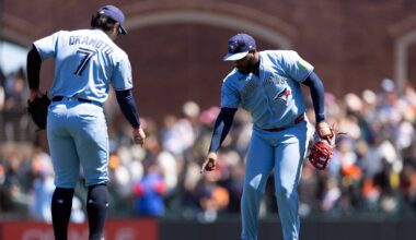 Jul 8, 2026; San Francisco, California, USA; Toronto Blue Jays third baseman Kazuma Okamoto (7) and first baseman Vladimir Guerrero Jr. (27) celebrate their 10-0 victory over the San Francisco Giants at Oracle Park. Mandatory Credit: D. Ross Cameron-Imagn Images