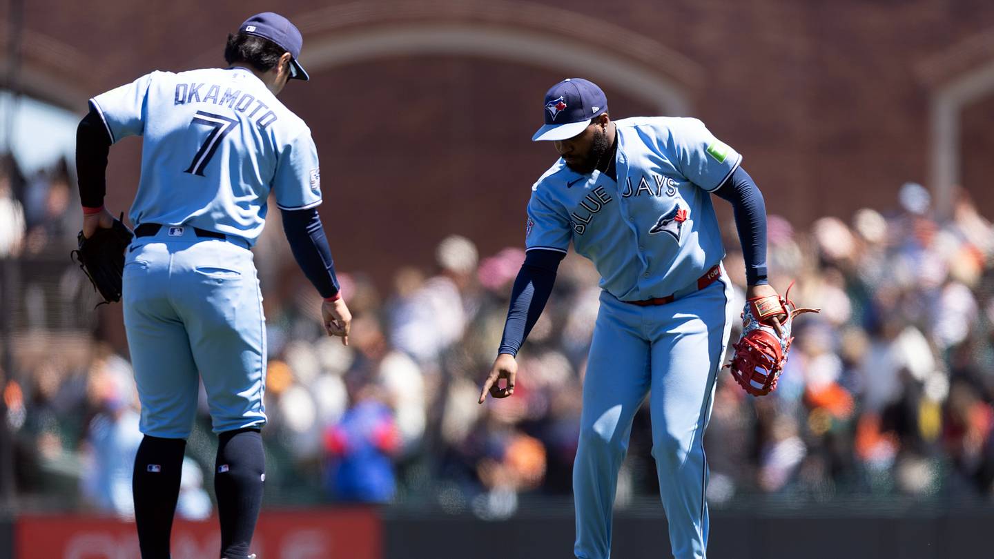 Jul 8, 2026; San Francisco, California, USA; Toronto Blue Jays third baseman Kazuma Okamoto (7) and first baseman Vladimir Guerrero Jr. (27) celebrate their 10-0 victory over the San Francisco Giants at Oracle Park. Mandatory Credit: D. Ross Cameron-Imagn Images