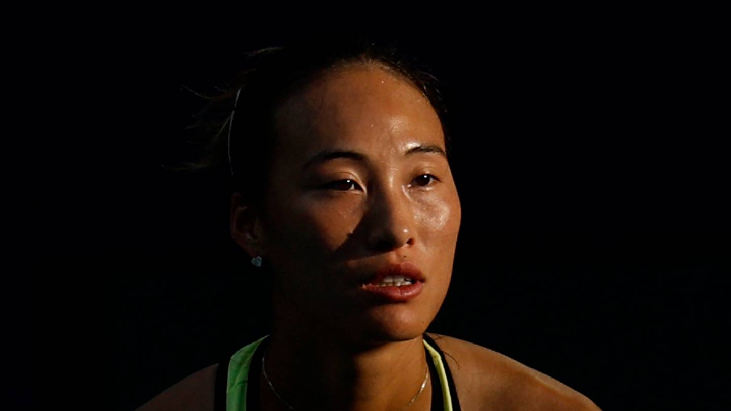 Qinwen Zheng prepares to return serve