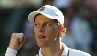 Jannik Sinner reacts after winning a point