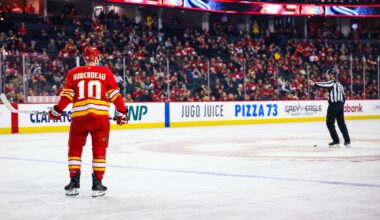Jan 5, 2026; Calgary, Alberta, CAN; Calgary Flames left wing Jonathan Huberdeau (10) takes a penalty shot against the Seattle Kraken during the first period at Scotiabank Saddledome. Mandatory Credit: Sergei Belski-Imagn Images