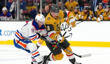 Dec 3, 2024; Las Vegas, Nevada, USA; Edmonton Oilers center Connor McDavid (97) defends against Vegas Golden Knights center Jack Eichel (9) during the second period at T-Mobile Arena. Mandatory Credit: Stephen R. Sylvanie-Imagn Images