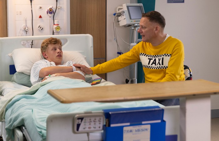 04_08_coro_dylan_hospital_02 Sean comforts Dylan in hospital in Coronation Street