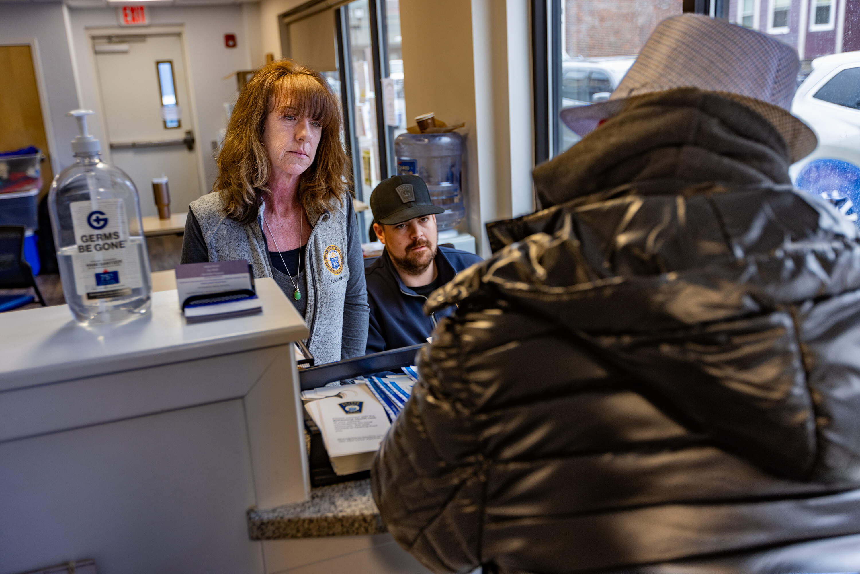 CarrieAnn Salemme, from Revere's Substance Use Disorder and Homeless Initiatives Office, holds weekly drop-in hours at a police substation for people to get help addressing their needs. (Jesse Costa/WBUR)